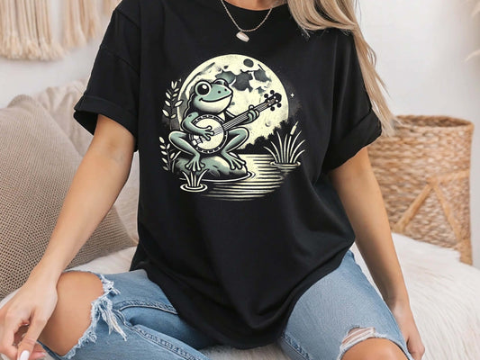 Cottagecore Frog Playing Banjo T-Shirt – Cute Aesthetic Nature Tee, Vintage Folk Music Shirt, Cozy Frog Lover Gift, Unisex Graphic Tee