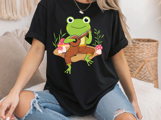 Cottagecore Aesthetic Frog Playing Banjo T-Shirt – Cute Vintage Nature Tee, Folk Music Lover Gift, Whimsical Woodland Graphic Shirt