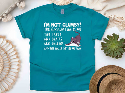 I'm Not Clumsy The Floor Just Hates Me T-Shirt – Funny Sarcastic Tee, Unisex Humor Shirt, Perfect Gift for Clumsy Friends and Family