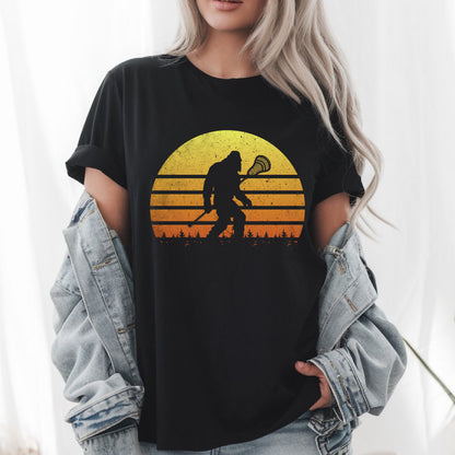 Bigfoot Lacrosse Retro T-Shirt – Funny Sasquatch Lax Player Tee, Cool Gift for Lacrosse & Cryptid Fans, Unisex Vintage Style Shirt