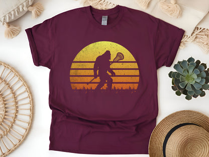 Bigfoot Lacrosse Retro T-Shirt – Funny Sasquatch Lax Player Tee, Cool Gift for Lacrosse & Cryptid Fans, Unisex Vintage Style Shirt